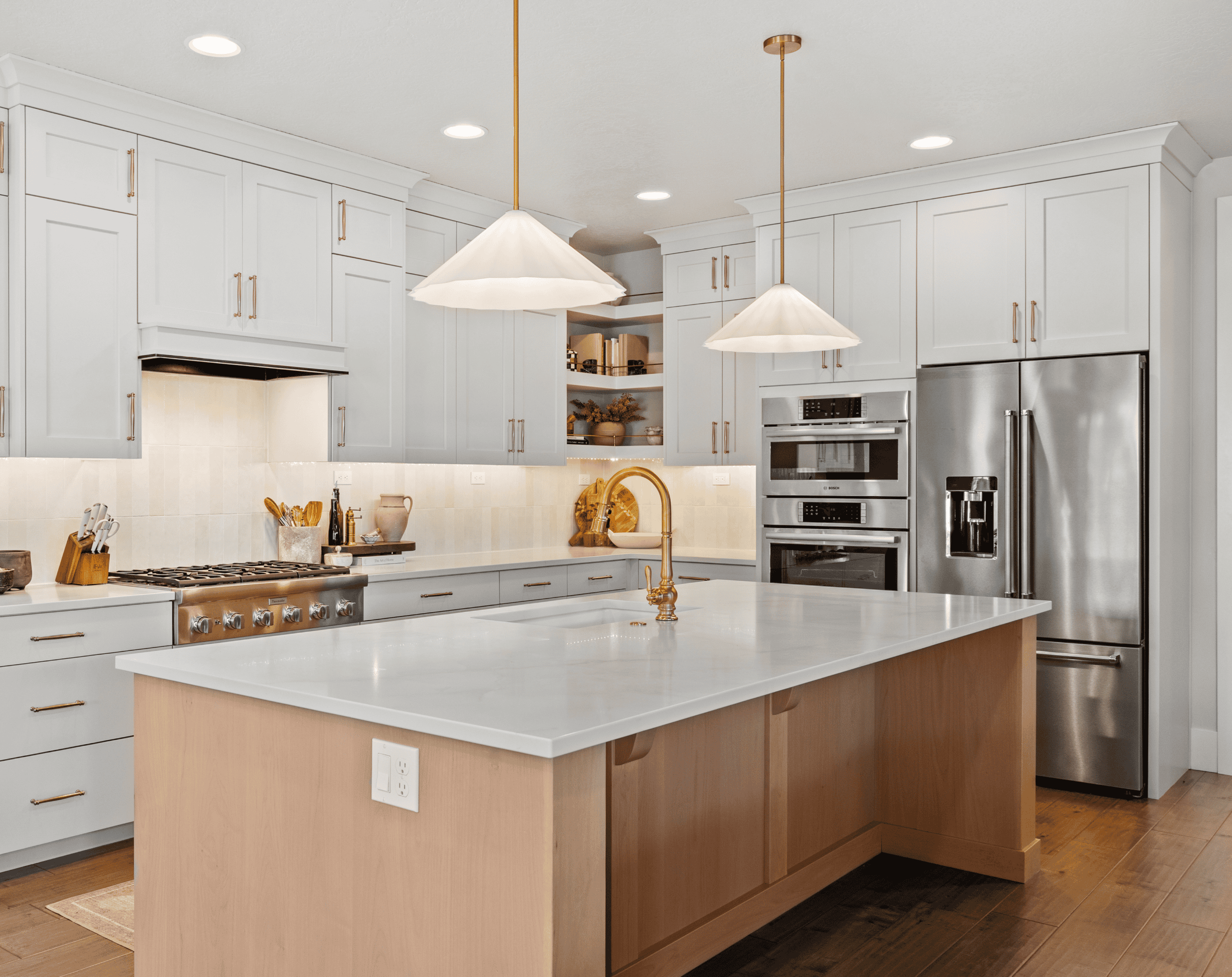 Modern Kitchen Design Bright modern kitchen with white cabinets, stainless steel appliances, and a large island.
